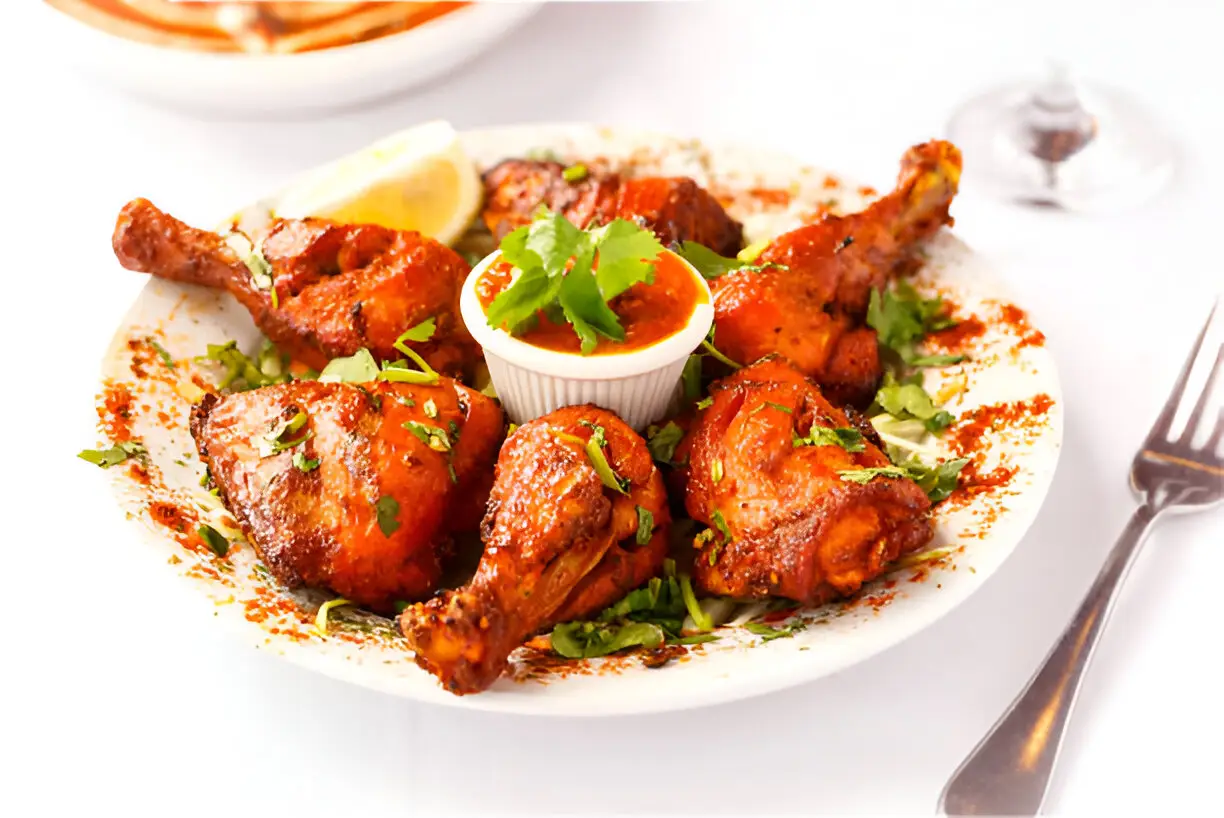 TANDOORI CHICKEN 25 TANDOORI CHICKEN